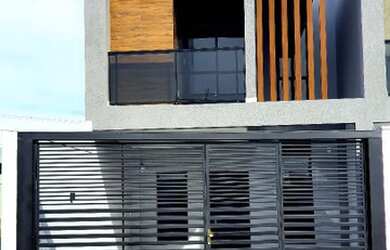 Imagem: A casa possui 3 Dormitórios, 3 Banheiros, 2 Vagas na garagem