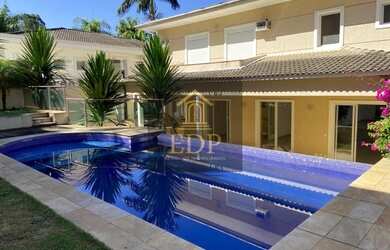 Imagem: A casa em condomínio possui 5 Dormitórios, 5 Banheiros, 5