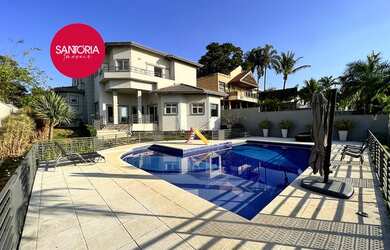 Imagem: A casa em condomínio possui 4 Dormitórios, 5 Banheiros, 5