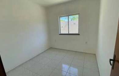 Imagem: A casa possui 2 Dormitórios, 2 Banheiros, 3 Vagas na garagem