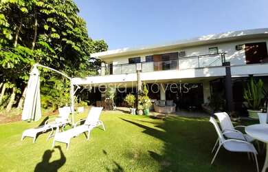 Imagem: A casa em condomínio possui 5 Dormitórios, 5 Banheiros, 3