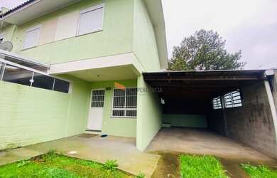 Imagem: A casa possui 2 Dormitórios, 1 Banheiro, 2 Vagas na garagem