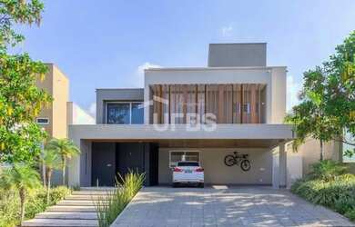 Imagem: A casa possui 5 Dormitórios, 5 Banheiros, 4 Vagas na garagem