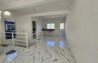 Imagem: A casa possui 3 Dormitórios, 3 Banheiros, 2 Vagas na garagem