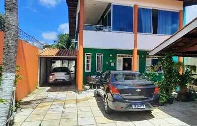 Imagem: A casa possui 5 Dormitórios, 5 Banheiros, 5 Vagas na garagem