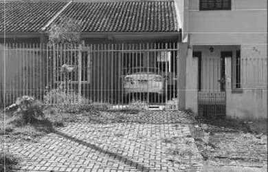 Imagem: A casa possui 3 Dormitórios, 1 Banheiro, 1 Vaga na garagem