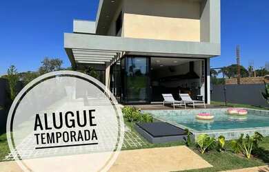 Imagem: A casa em condomínio possui 4 Dormitórios, 4 Banheiros, 5