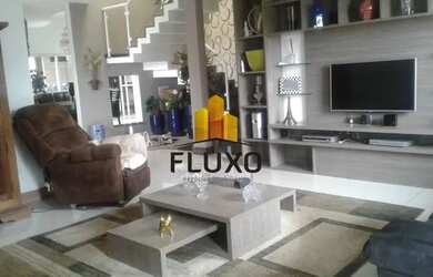 Imagem: A casa possui 4 Dormitórios, 4 Banheiros, 3 Vagas na garagem