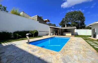 Imagem: A casa possui 5 Dormitórios, 5 Banheiros, 5 Vagas na garagem