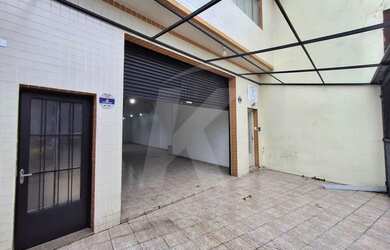 Imagem 11: Salão comercial com 1 banheiro, porta de aço e 1 vaga de garagem