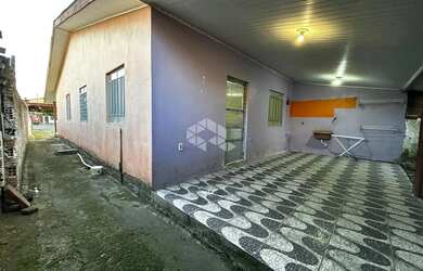 Imagem: A casa possui 3 Dormitórios, 1 Banheiro, 56m² de Área e