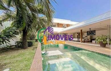 Imagem: A casa em condomínio possui 5 Dormitórios, 5 Banheiros, 4