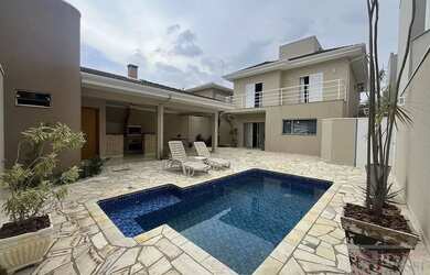 Imagem: A casa em condomínio possui 3 Dormitórios, 4 Banheiros, 4