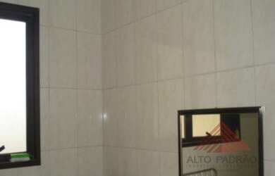 Imagem: O apartamento possui 3 Dormitórios, 1 Banheiro e 2 Vagas na