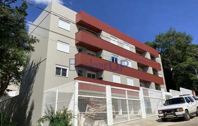 Imagem: O apartamento possui 2 Dormitórios, 1 Banheiro, 2 Vagas na