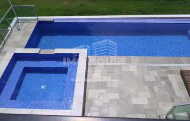 Imagem: A casa possui 5 Dormitórios, 5 Banheiros, 5 Vagas na garagem