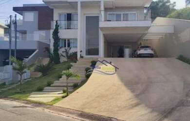 Imagem: A casa em condomínio possui 4 Dormitórios, 5 Banheiros, 5