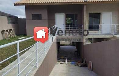 Imagem: A casa possui 3 Dormitórios, 2 Banheiros, 5 Vagas na garagem