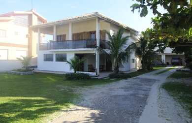 Imagem: A casa possui 5 Dormitórios, 5 Banheiros, 5 Vagas na garagem