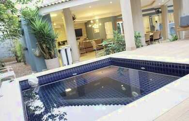 Imagem: A casa em condomínio possui 4 Dormitórios, 5 Banheiros, 4