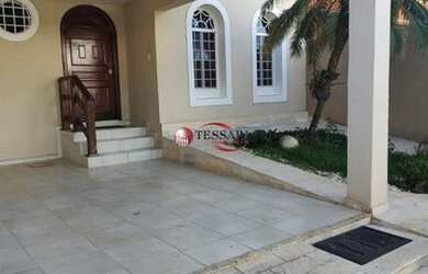 Imagem: A casa possui 3 Dormitórios, 5 Banheiros, 4 Vagas na garagem