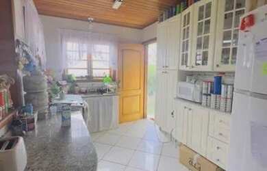 Imagem: A casa em condomínio possui 5 Dormitórios, 5 Banheiros, 5