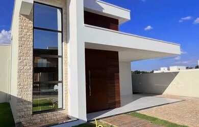 Imagem: A casa possui 3 Dormitórios, 3 Banheiros, 3 Vagas na garagem