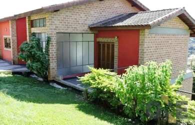 Imagem: A casa em condomínio possui 4 Dormitórios, 5 Banheiros, 4