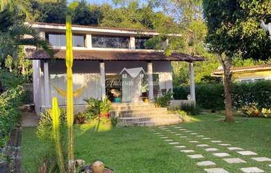 Imagem: A casa em condomínio possui 4 Dormitórios, 5 Banheiros, 2