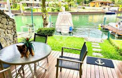 Imagem: A casa possui 3 Dormitórios, 4 Banheiros, 1 Vaga na garagem