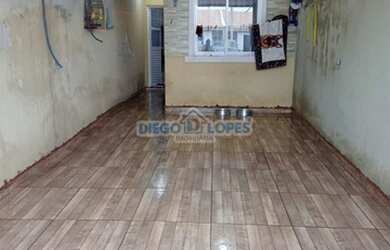 Imagem: A casa possui 2 Dormitórios, 1 Banheiro, 1 Vaga na garagem