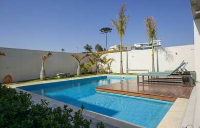 Imagem: A casa em condomínio possui 4 Dormitórios, 5 Banheiros, 4