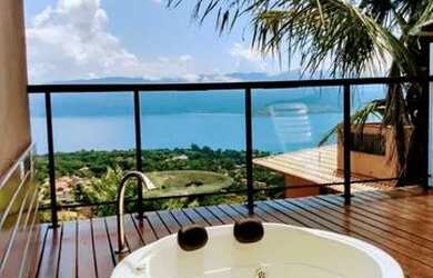 Imagem: A casa possui 3 Dormitórios, 3 Vagas na garagem e está localizado