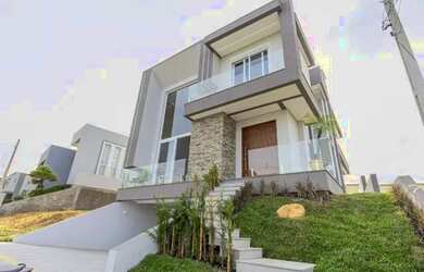 Imagem: A casa em condomínio possui 3 Dormitórios, 4 Banheiros, 4