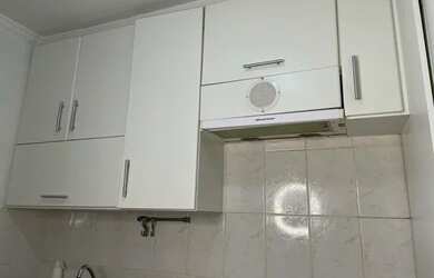 Imagem: O apartamento possui 2 Dormitórios, 1 Banheiro, 1 Vaga na garagem