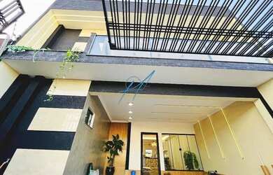 Imagem: A casa possui 4 Dormitórios, 3 Banheiros, 2 Vagas na garagem