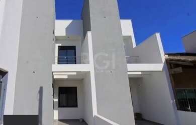 Imagem: A casa possui 2 Dormitórios, 2 Banheiros, 1 Vaga na garagem