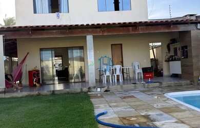 Imagem: A casa possui 4 Dormitórios, 1 Banheiro, 5 Vagas na garagem