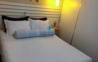 Imagem: A casa à venda possui 2 Dormitórios, 3 Banheiros, 2 Vagas