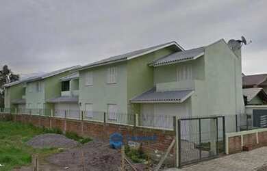 Imagem: A casa possui 3 Dormitórios, 2 Banheiros, 1 Vaga na garagem