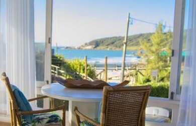 Imagem: A casa possui 5 Dormitórios, 5 Banheiros, 3 Vagas na garagem