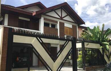 Imagem: A casa em condomínio possui 4 Dormitórios, 4 Banheiros, 4