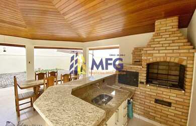 Imagem: A casa em condomínio possui 4 Dormitórios, 5 Banheiros, 4