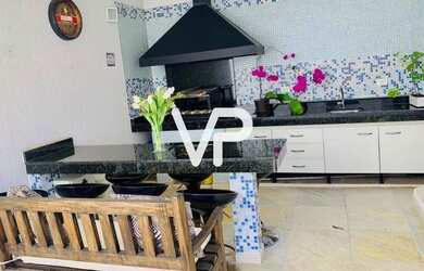 Imagem: A casa possui 3 Dormitórios, 5 Banheiros, 4 Vagas na garagem