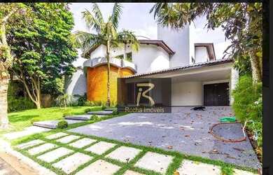 Imagem: A casa em condomínio possui 4 Dormitórios, 5 Banheiros, 504m²