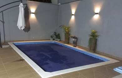 Imagem: A casa possui 3 Dormitórios, 4 Banheiros, 364m² de Área e