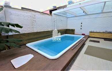 Imagem: A casa possui 4 Dormitórios, 4 Banheiros, 2 Vagas na garagem