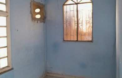 Imagem: A casa possui 2 Dormitórios, 1 Banheiro, 1 Vaga na garagem