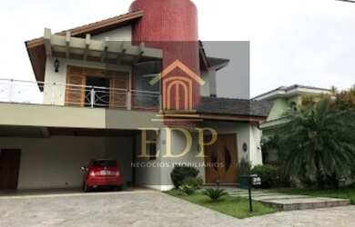 Imagem: A casa em condomínio possui 4 Dormitórios, 5 Banheiros, 4