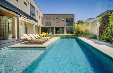 Imagem: A casa em condomínio possui 5 Dormitórios, 5 Banheiros, 5